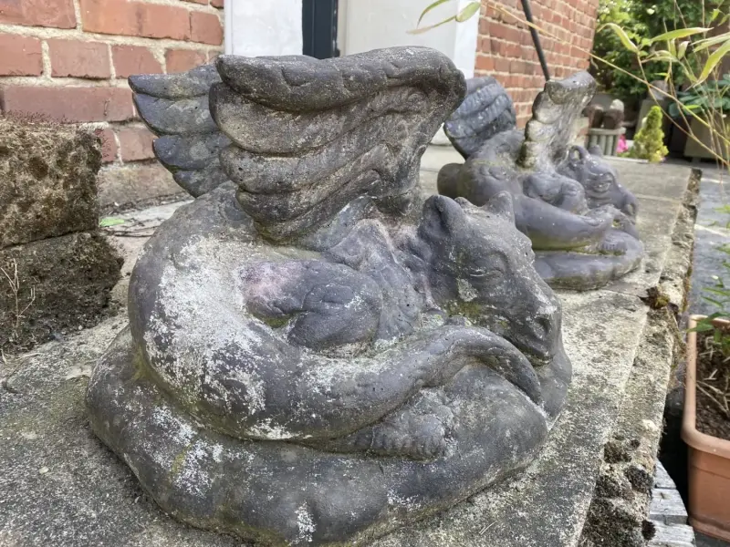 Product image 2 of the product “Lying Dragon on stone, ca. 50 cm L antique finish, pressed stone ”